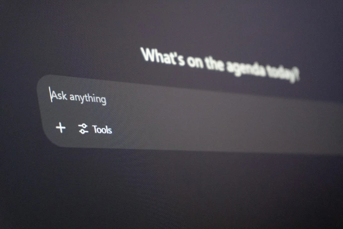 Digital interface with "ask anything" prompt.